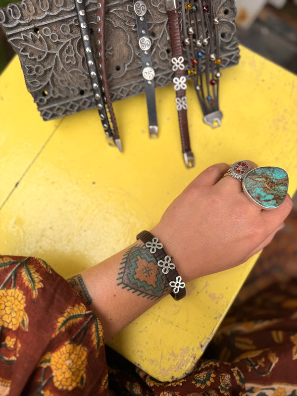 Leather Bracelet with Flower Symbol