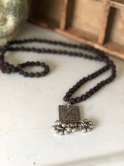 Indian Rudraksha Mala prayer beads with metal charm